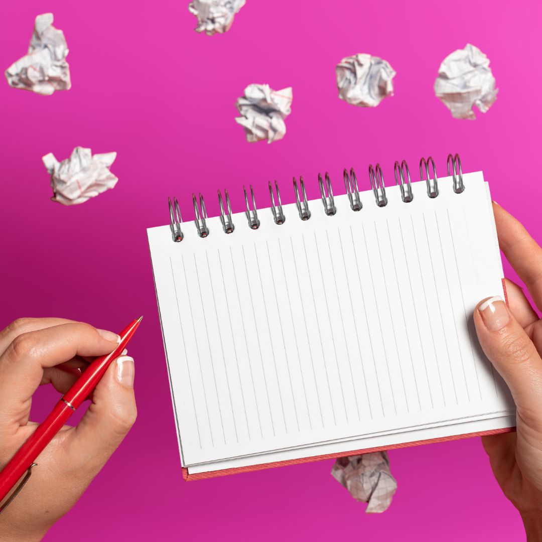 copilot-draft-reports Blank sheet of paper surrounded by earlier drafts