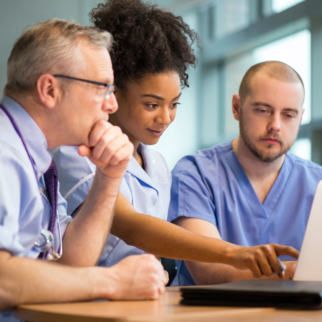 employee-engagement-digital-skills-training A team of medical staff exploring training options online