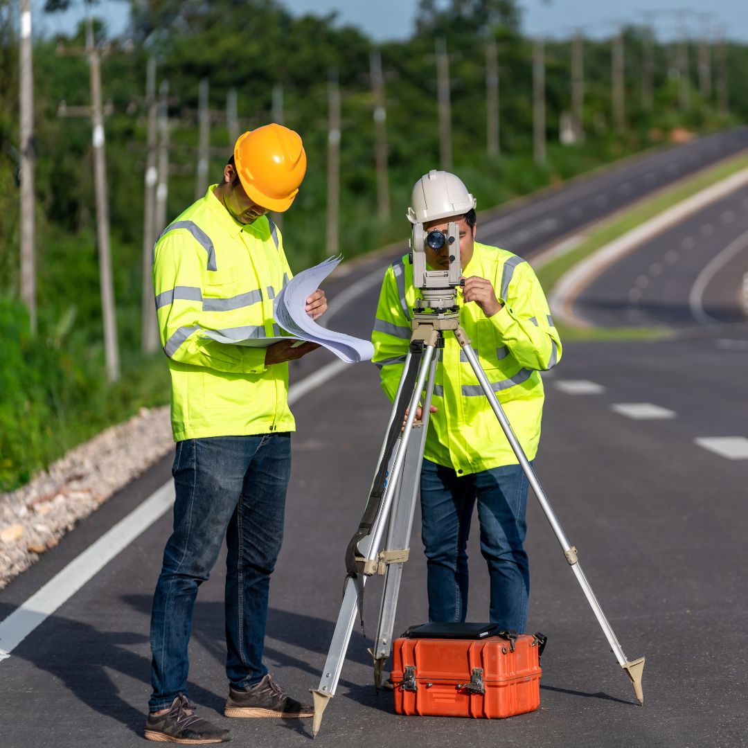 map-your-digital-skills-gap A team of surveyors in high-vis jackets at work on a roadside